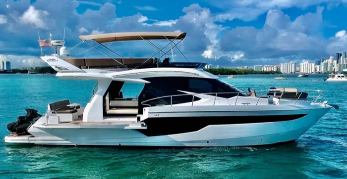 Andiamo under way in clear turquoise water