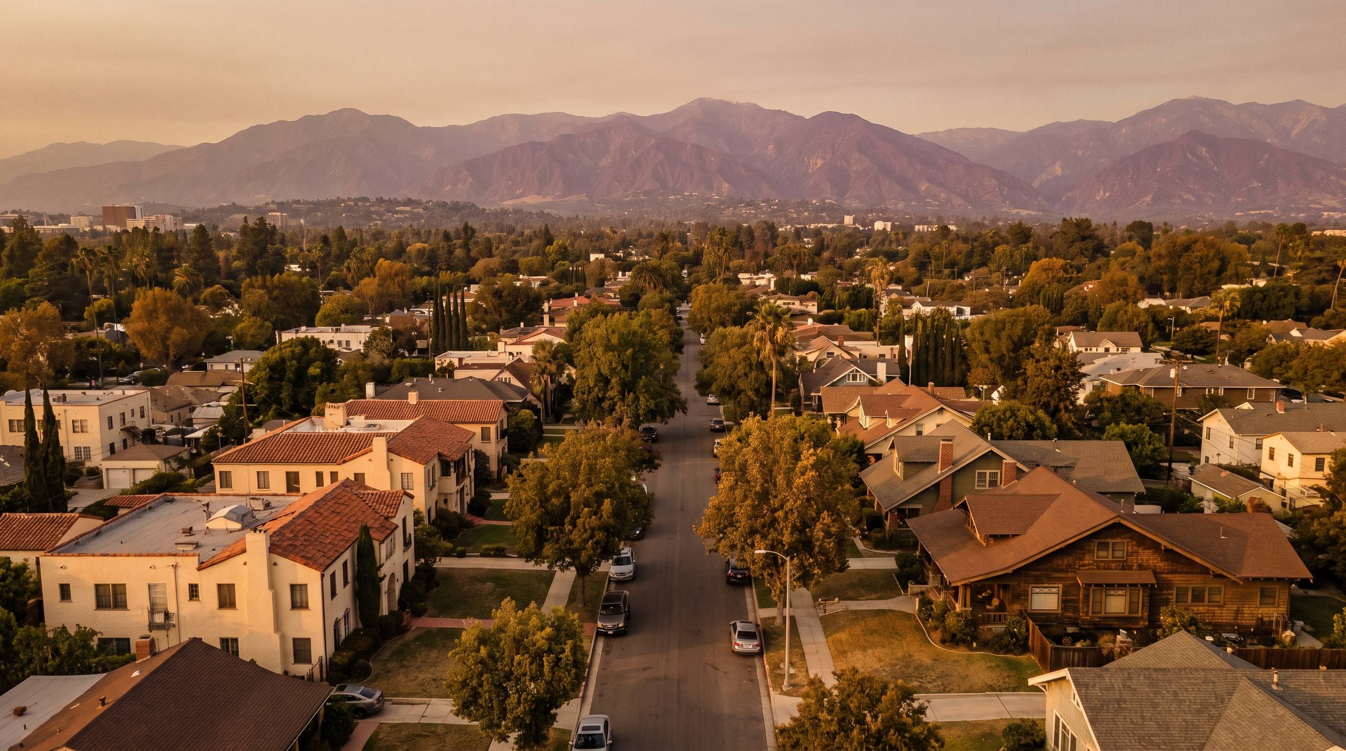 An aerial view over Pasadena and the San Gabriel Valley toward the mountains